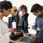 Engineers from multiple industries reviewing 3D-printed components manufactured at Tronix3D's Pittsburgh facility.